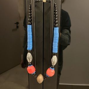 Beaded necklace from Senegal, West Africa: blue, red, black, bronze